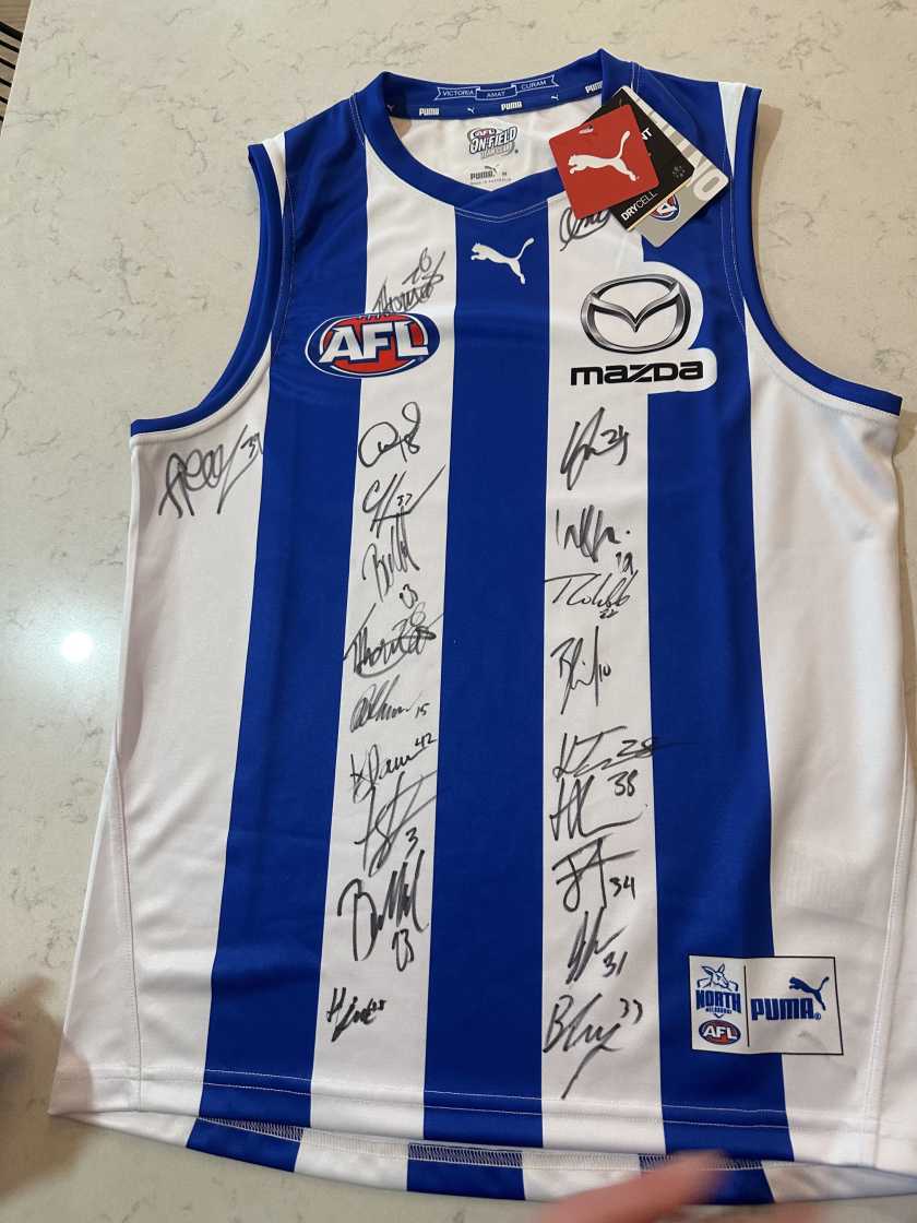 Signed North Melbourne Football Jumper more details and photos to
